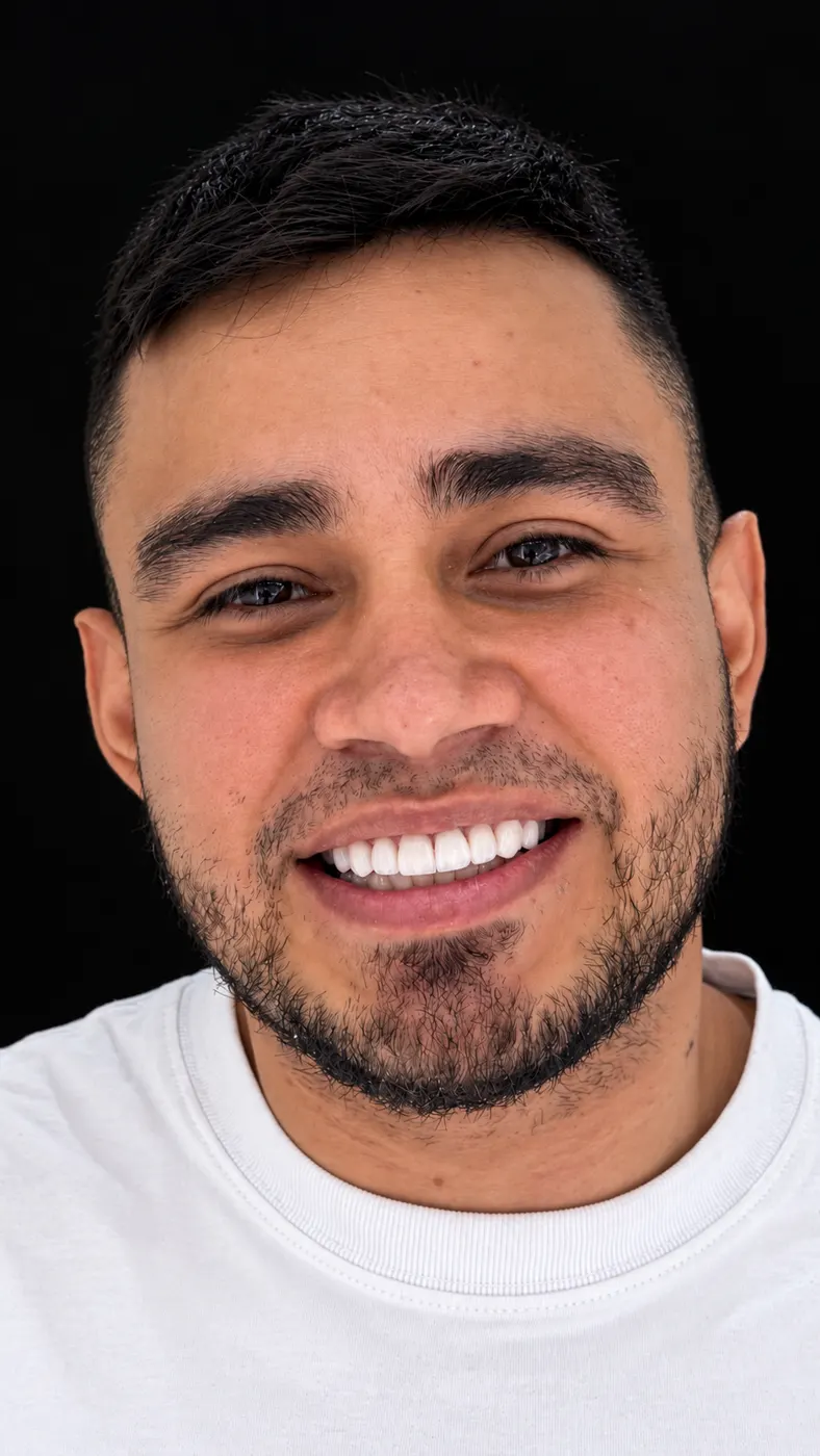 Patient smiling after restoration of a missing tooth